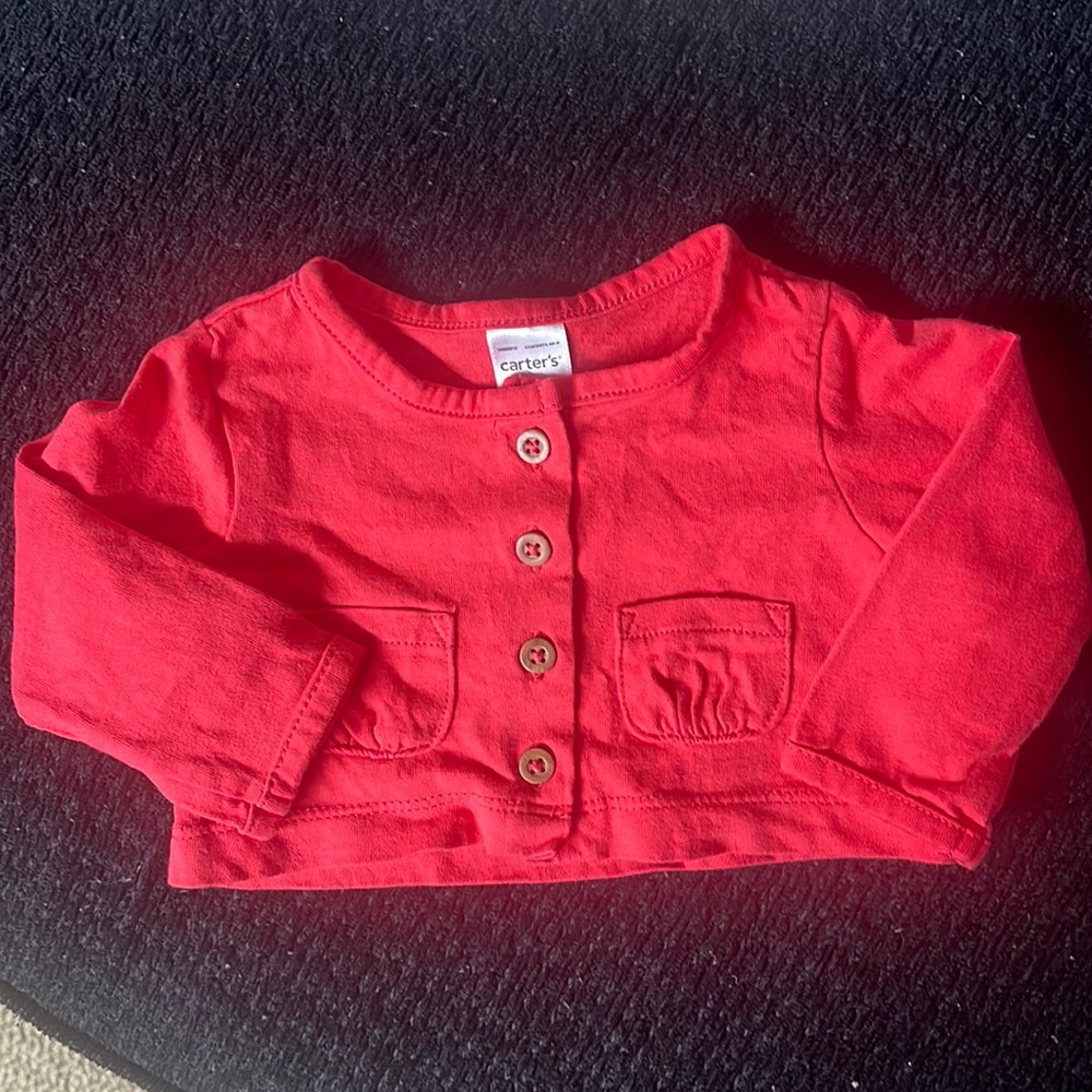 Carter’s size 3 months red long sleeve top. So cute!